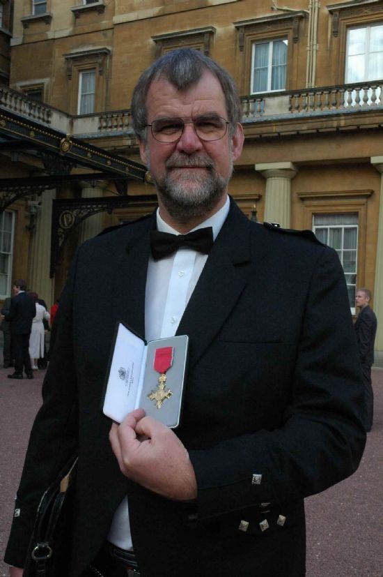 Awarded the OBE at Buckingham Palace in 2005